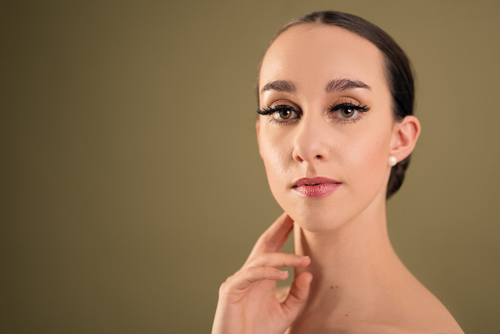 Image of Erica, a ballerina. A portrait of Erica looking directly at the camera